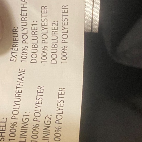 Black Quilted Puffer Vest with Zipper Closure and Stand-Up Collar - Picture 2 of 4